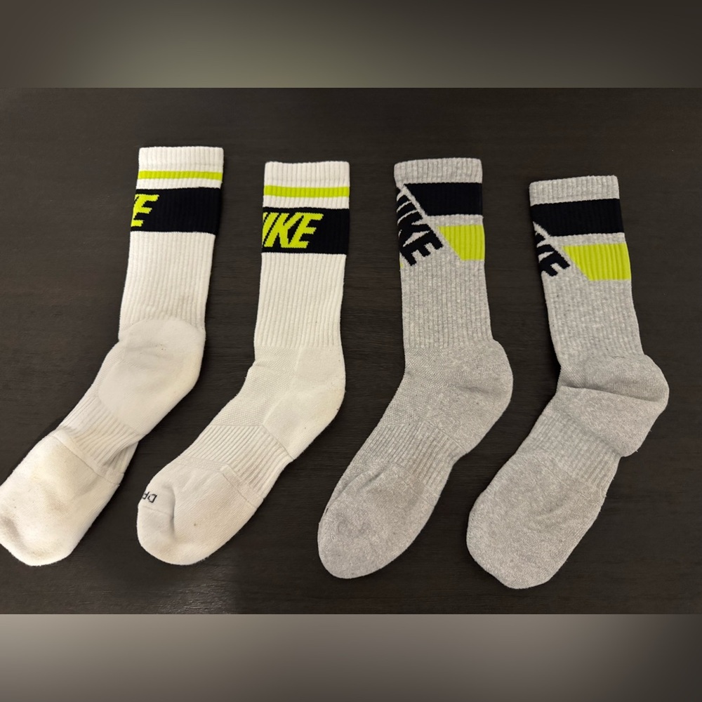 2 pairs of Nike Men's White and Gray Crew Socks with Black and Yellow Accents